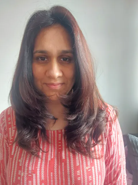 Smooth brunette blowout finished at the client's home